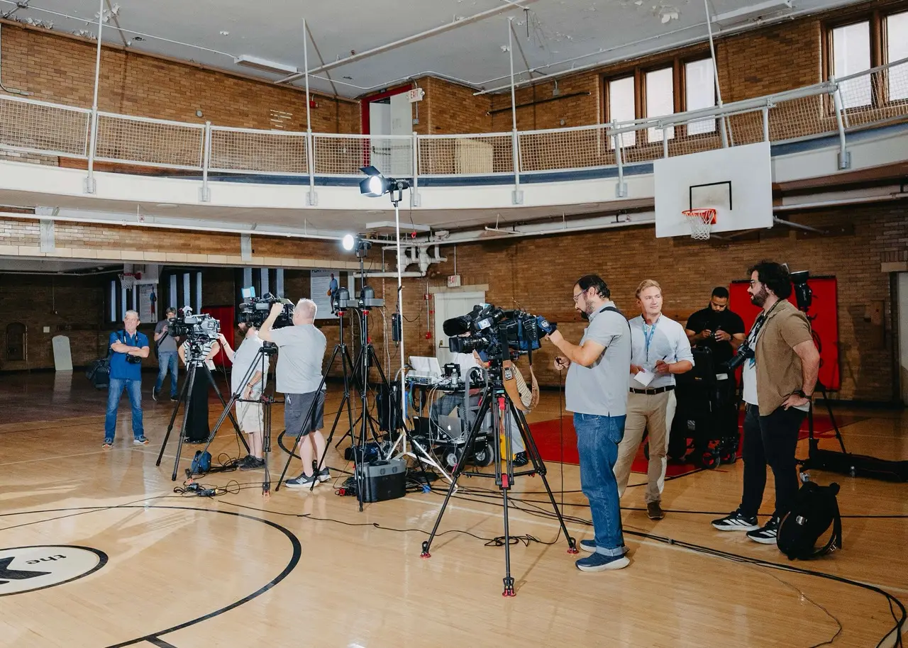 Local TV & radio setting up pre-event.